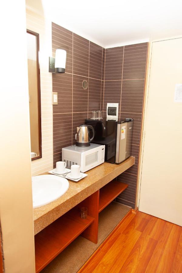 Holiday Suites Tacna Buitenkant foto
