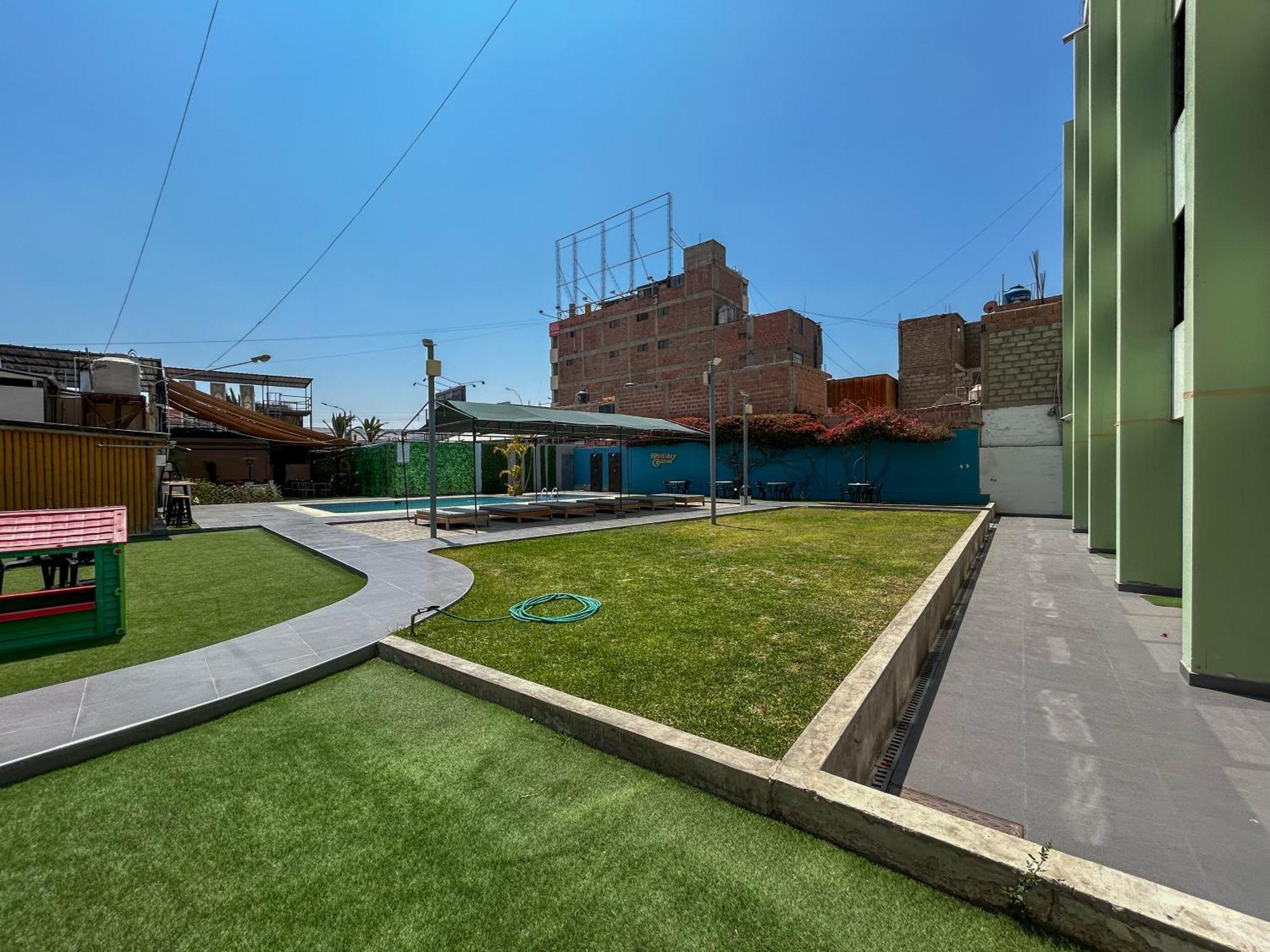 Holiday Suites Tacna Buitenkant foto