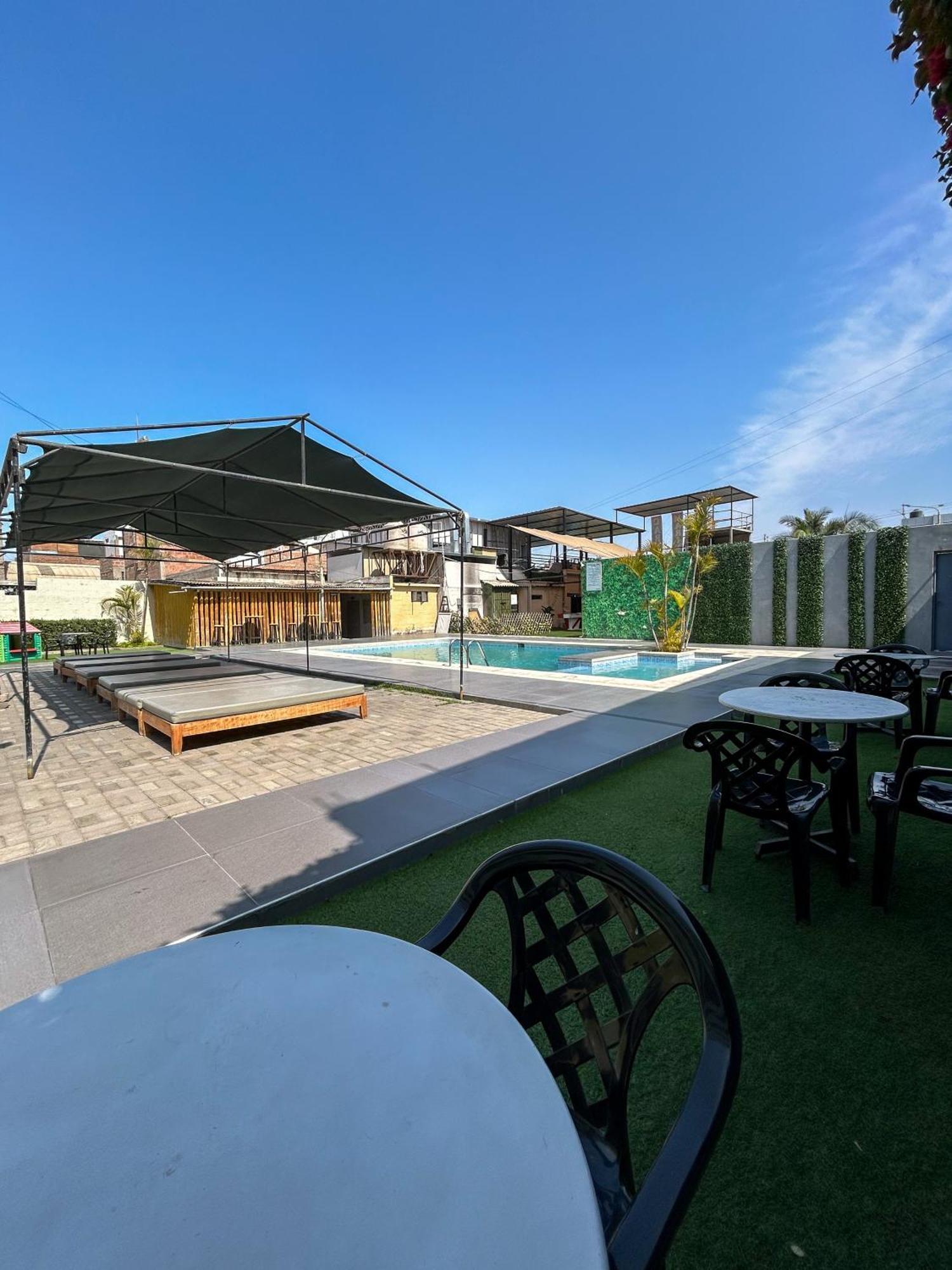 Holiday Suites Tacna Buitenkant foto